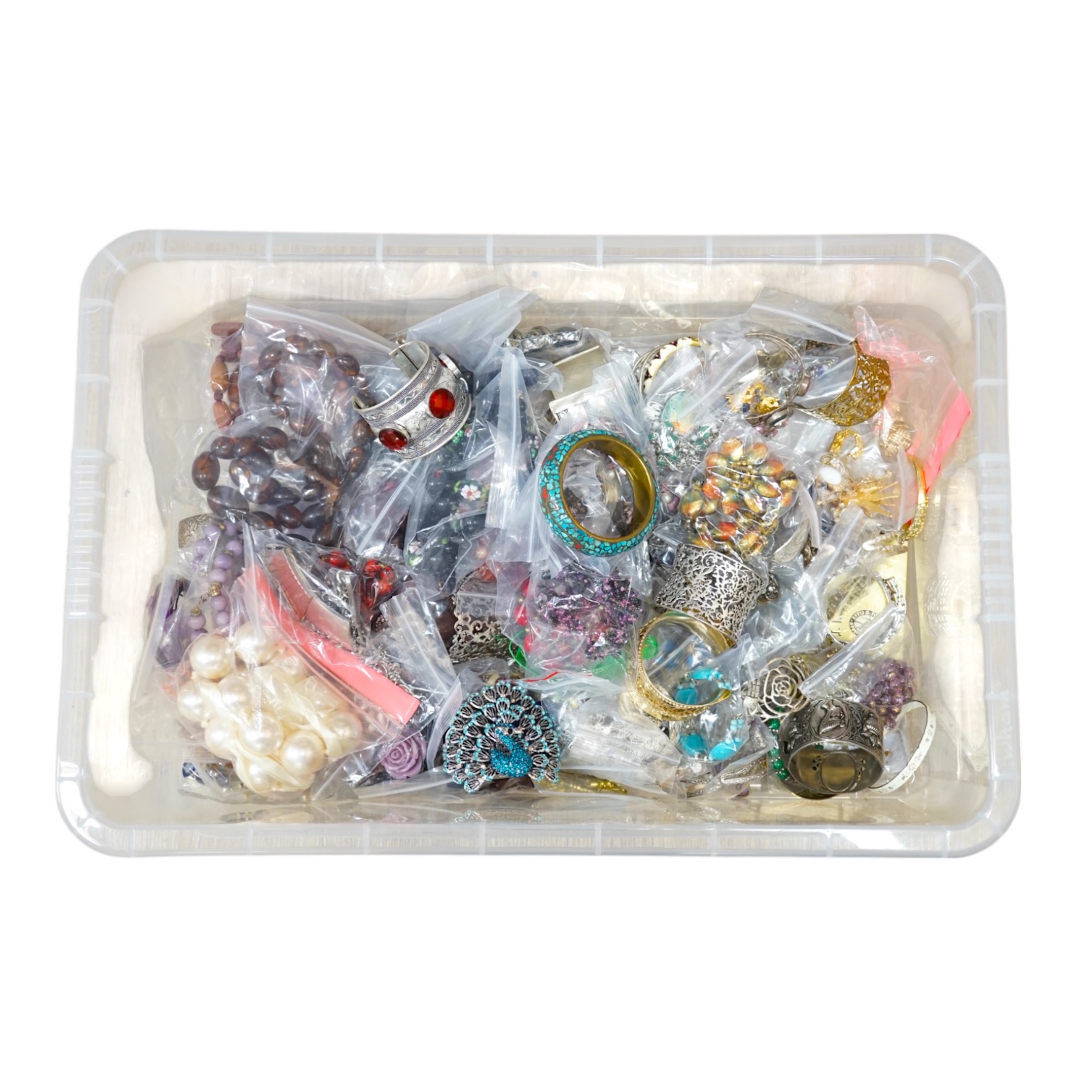 A large quantity of assorted mainly costume jewellery including bead necklaces, bangles, bracelets etc. Condition - fair to good